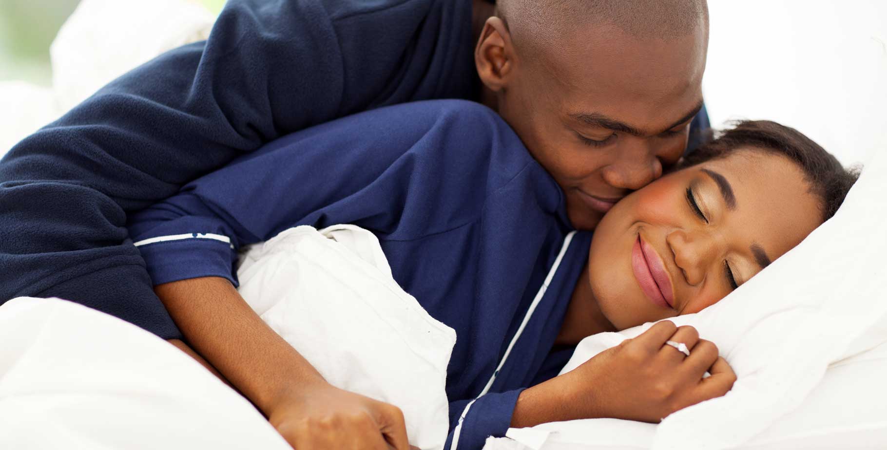black couple in bed
