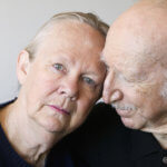 Close-up of senior couple focusing on worried woman